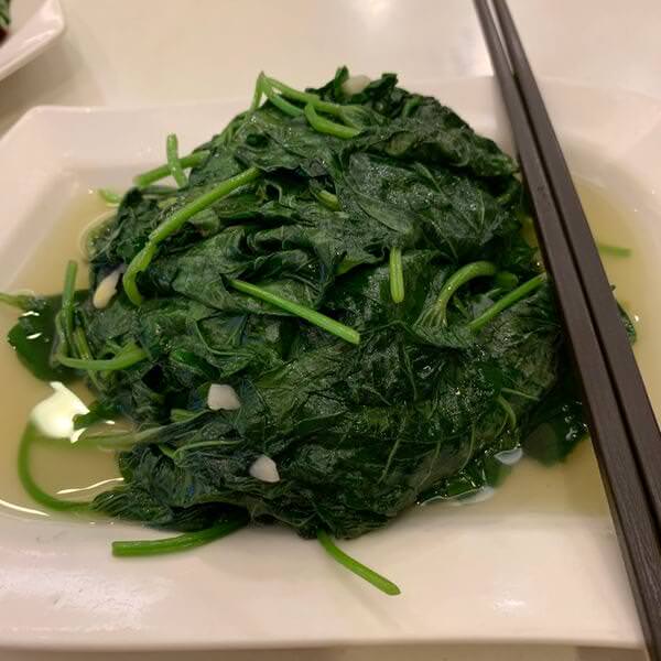 全家福客家菜館竹北館。清炒地瓜葉